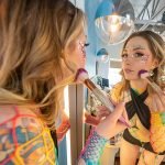 Ailee Anne applying make-up in mirror pretty girl