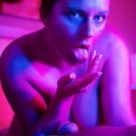 Isabelle Reese licks sperm off of her fingers after VR sex.